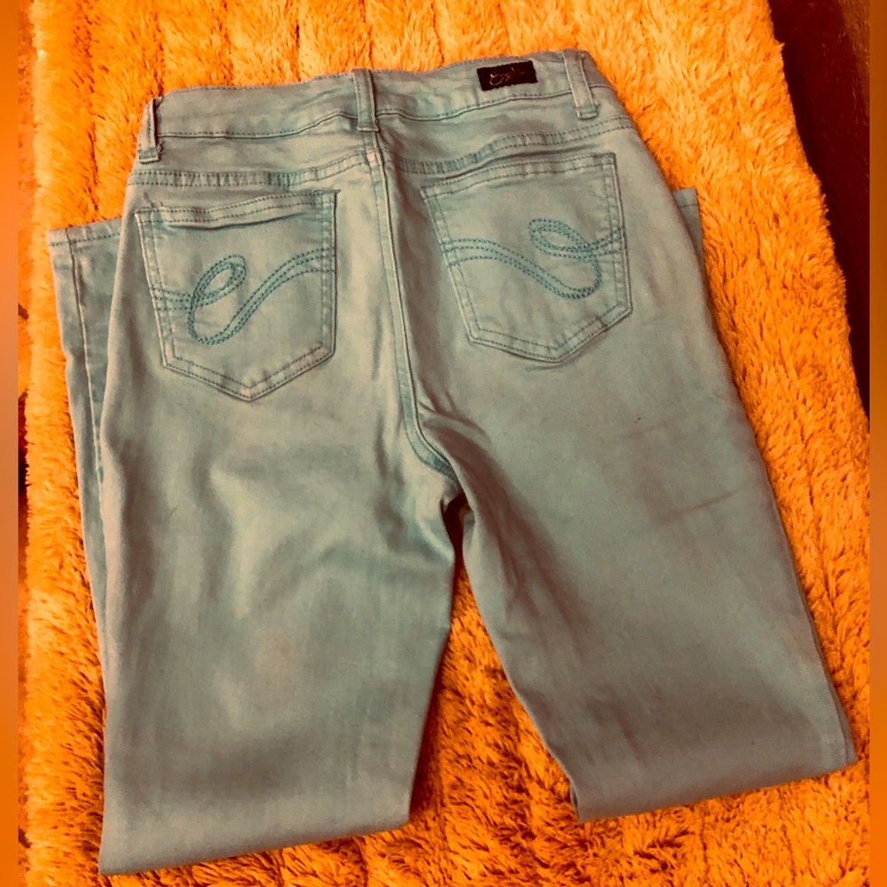 Neon aqua skinny ankle jeans